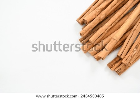 Top view of Fragrant cinnamon sticks isolated on white. Cinnamon isolated on white background cutout. Top view.