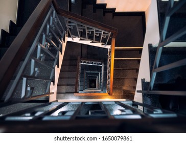 Top view, Frame square of vintage spiral staircase with light shiny in hotel - Powered by Shutterstock