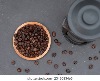 top view of french press coffee maker teapot and coffee beans - Powered by Shutterstock