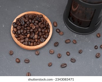 top view of french press coffee maker teapot and coffee beans - Powered by Shutterstock