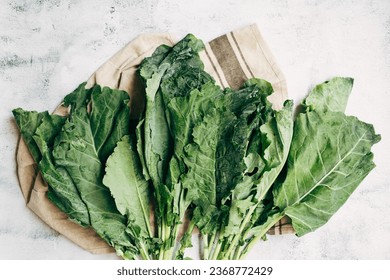 Top view fresh Collard Green on a white background.  super food. healthy food vegetarian concept. - Shutterstock ID 2368772429