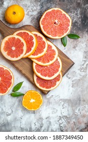 top view fresh grapefruits sliced fruits on light-background citrus fresh juice fruit photo