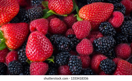 Top View of Fresh mix Fruits strawbery blackberry and raspberry