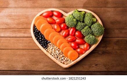 Top View Of Fresh Organic Fruits And Vegetables In Heart Plate Wood (carrot, Broccoli, Tomato) On Wooden Table, Healthy Lifestyle Diet Food Concept