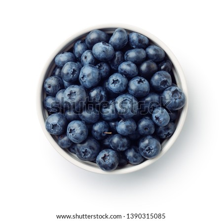 Top view of fresh ripe blueberries in bowl isolated on white