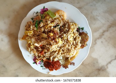 Top View Fried Rice With Fried Egg On Top. Popular Penang Hawker Food.