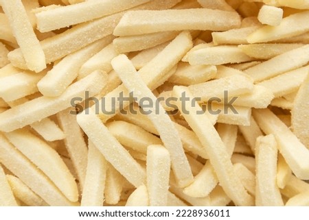 Top view of frozen shoestring french fries 

