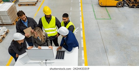 Top view of full team of warehouse employees in warehouse. Team of workers, managers, female director in modern factory, heavy industry, manufactrury. - Powered by Shutterstock