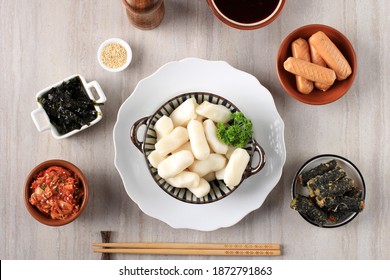 Top View Garaetteok Korean Bar Rice Cake (Stick Of Rounded Rice Cake) With Mozarella Cheese Inside. Raw Ingredient Making Tteteokbokki, Korean Traditional Food.