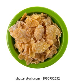 Top View Of Generic Frosted Corn Flakes In A Green Bowl Isolated On A White Background.