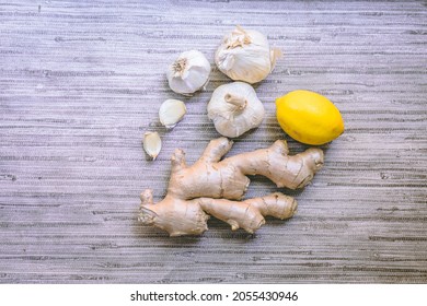 Top View Of Ginger, Lemon And Garlic. Immune System Boosters