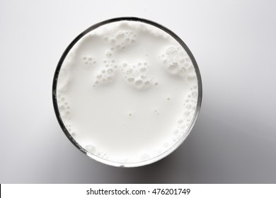 Top View Of Glass Milk / Glass Of Milk From Above / Gray Tone