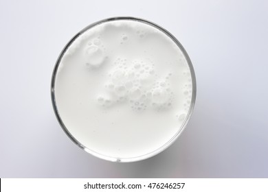 Top View Of Glass Milk / Glass Of Milk From Above / Gray Tone