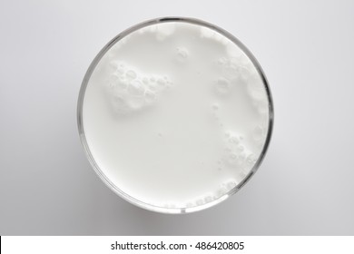 Top View Of Glass Milk / Glass Of Milk From Above / Gray Tone