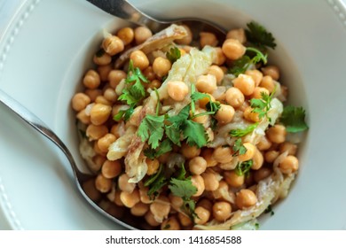 Top View Of Grain Salad With Cod And Coriander. Typical Portuguese Cuisine