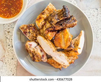 Top View Of Grilled Chicken Pieces In The Dish.