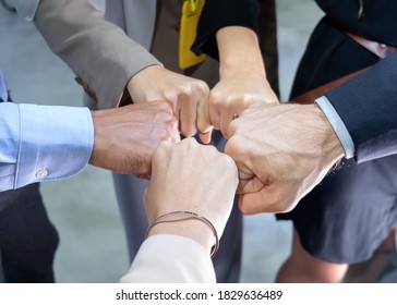 The Top View Of A Group Of Businesspeople Does Circle Shape Hand And Bump Of The Team In The Office. Job Successes And Teamwork Concept. Work Of Diversity Of Culture. Good Environment In Workplace.