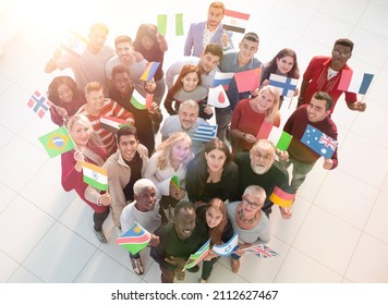 Top View Group Of Diverse People Waving Flags