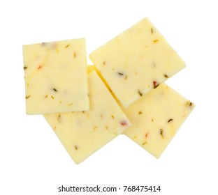 Top View Of A Group Of Fresh Pepper Jack Cheese Squares Isolated On A White Background.