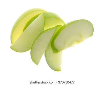 Top View Of A Group Of Green Apple Slices Isolated On A White Background.