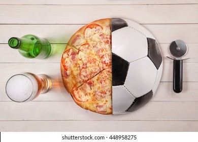 Top View Of Half Soccer Ball / Half Pizza And Beer. Creative Concept. Idea