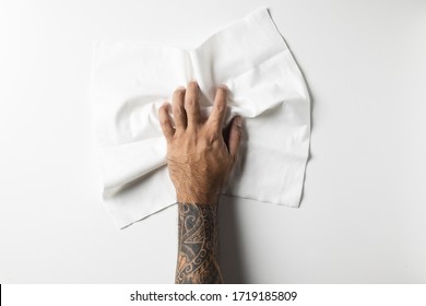 top view of hand with white cleaning rag isolated on white background