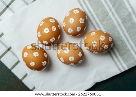 Top view  of hand-painted daisy Ester eggs