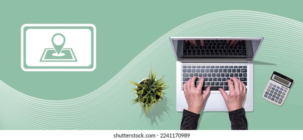 Top view of hands using laptop with symbol of gps concept - Shutterstock ID 2241170989