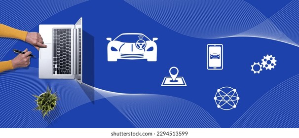 Top view of hands using laptop with symbol of driverless car concept