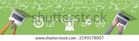 Top view of hands using laptop with symbol of competence concept