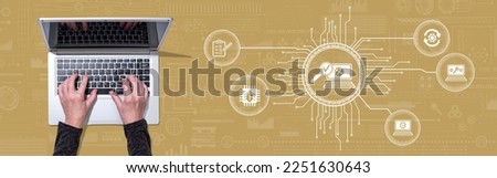 Top view of hands using laptop with symbol of software testing concept