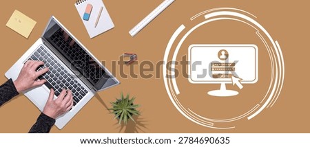 Top view of hands using laptop with symbol of login concept