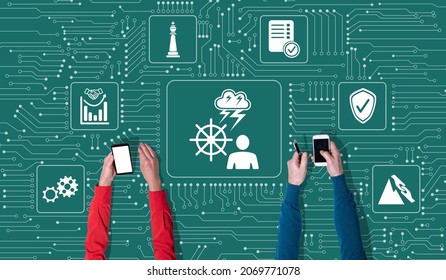 Top View Of Hands Using Mobile Phone With Symbol Of Crisis Management Concept