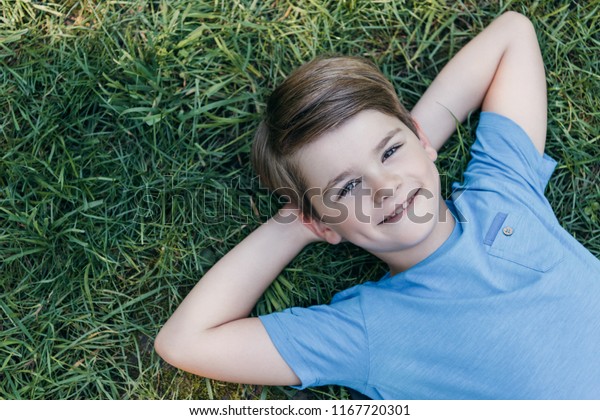 Top View Happy Boy Lying Hands Stock Photo 1167720301 | Shutterstock