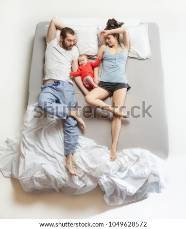 Similar – Image, Stock Photo Man showing baby clothes to pregnant woman