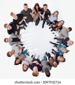 Top View . Happy Group Of Young People Standing In A Circle