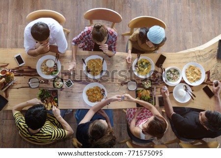 Image, Stock Photo Young friends looking map with healthy drinks and snacks