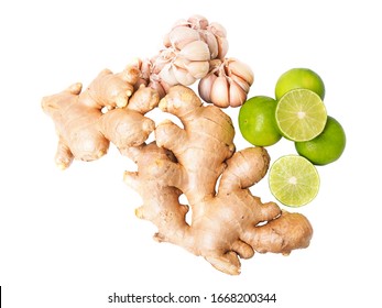 Top View Of Herbs And Spices With Green Lime Lemon, Ginger And Garlic Isolated On White Background.