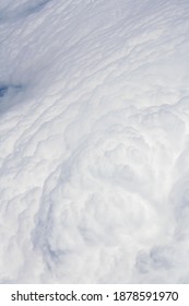 Top View From High Altitude Of Fluffy And Soft White Cloud Texture Pattern Like Cotton, Foam Or Snow. Use For Wallpaper, Background Or Backdrop. No People. Copy Space. 