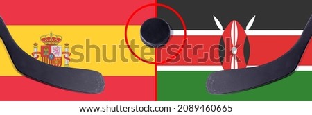 Top view hockey puck with Spain vs. Kenya command with the sticks on the flag. Concept hockey competitions