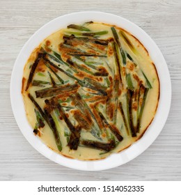 Top View, Homemade Korean Pajeon Scallion Pancake On A White Plate On A White Wooden Background, Top View. Asian Food. Flat Lay, Overhead, From Above. 