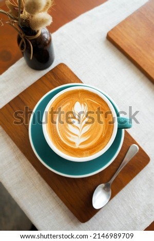 Top view of Hot cappuccino on table