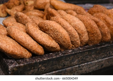 Top View Of Hot And Spicy Onion Or Pyaaz Kachori And Rajasthani Mirchi Bada / Jodhpuri Mirchi Vada Indian Street Food Snack Jaipur, Rajasthan India. Traditional Deep Fried Fast Food Item In Gram Flour