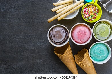 Top View Ice Cream Flavors In Cup On Blackground