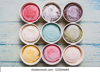 Top View Ice Cream Flavors In Cup On Blackground