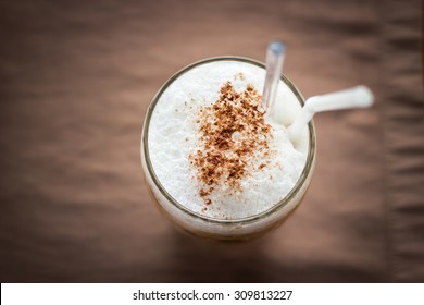 Top view of iced coffee with soft microfoam