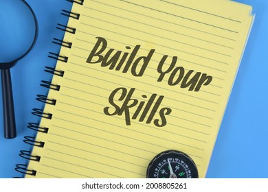 Top View Image Of Book With Build Your Skills Phrase. Development Concept