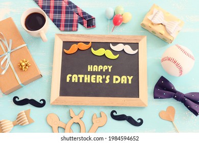 top view image of fathers day composition with vintage father's accessories and blackboard - Powered by Shutterstock