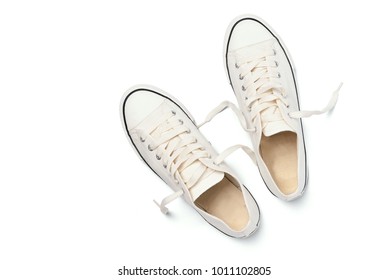 Top view image of New white sneakers isolated on white background - Powered by Shutterstock