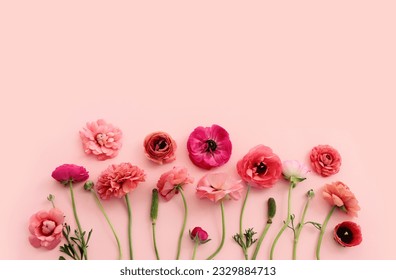 Top view image of pink flowers composition over pastel background - Powered by Shutterstock